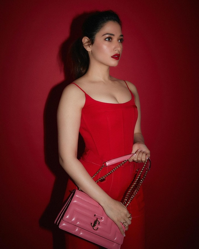 700px x 875px - Pics : Red Hot Tamannaah tempts with Tight Cleavage