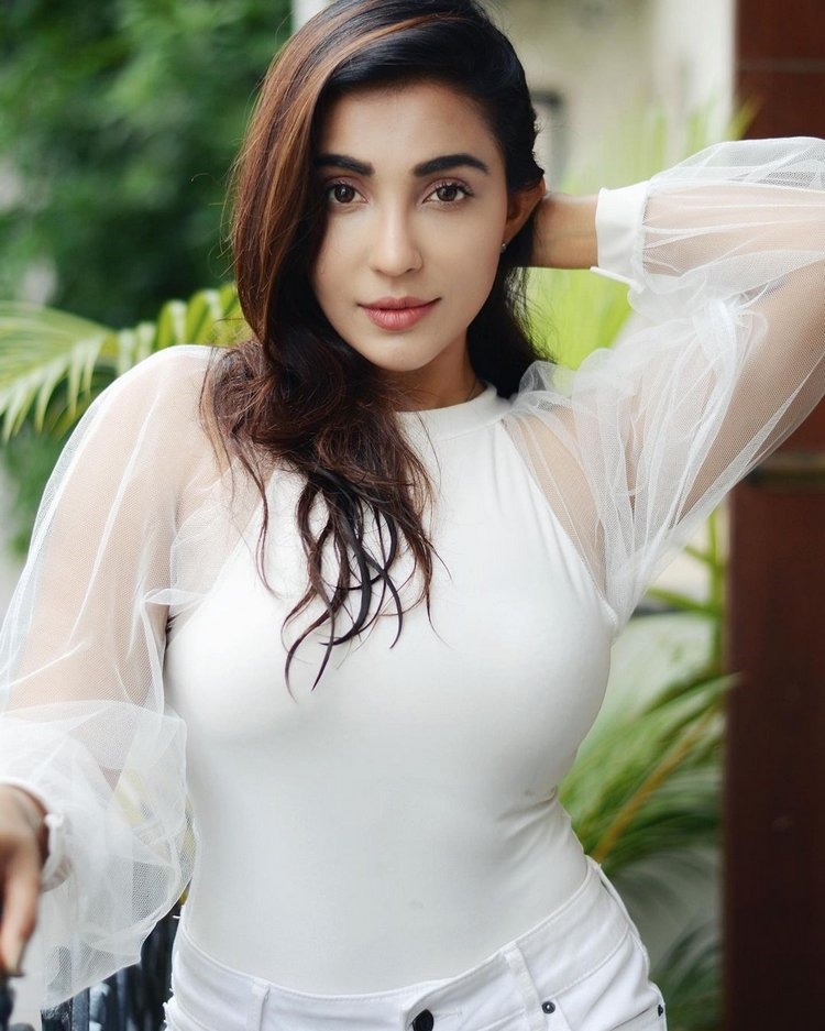 Parvati Nair Latest Photos In White Dress