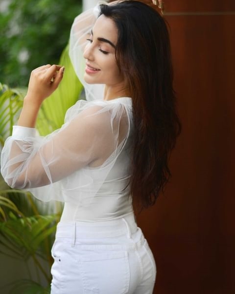 Parvati Nair Latest Photos In White Dress