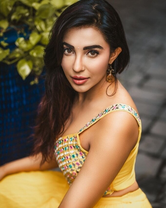 Parvati Nair Photos In Yellow Dress