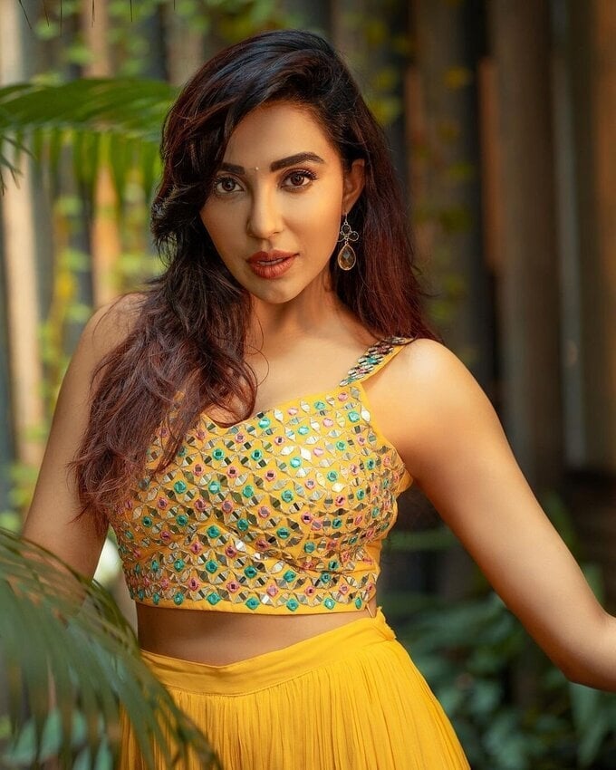 Parvati Nair Photos In Yellow Dress