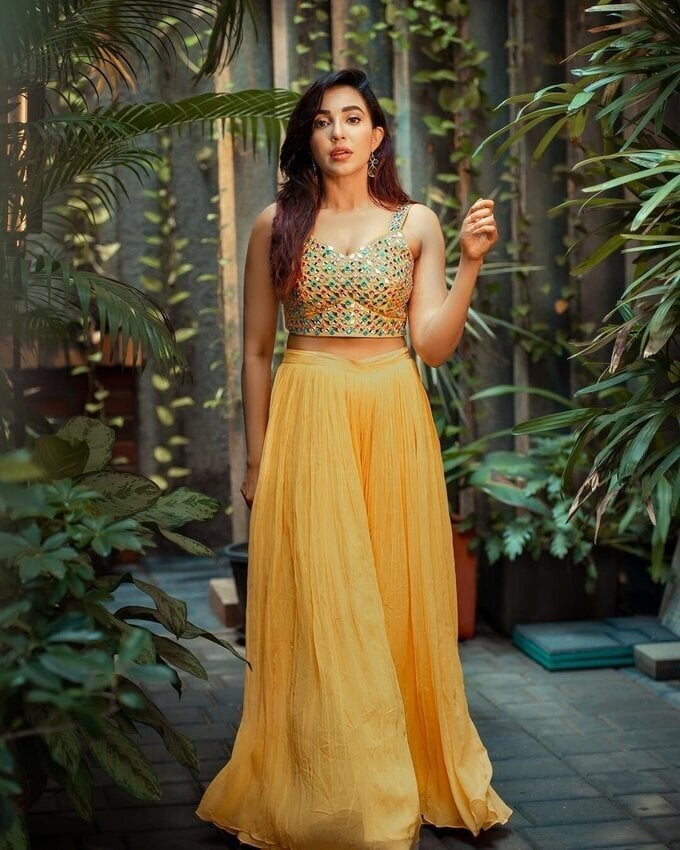 Parvati Nair Photos In Yellow Dress