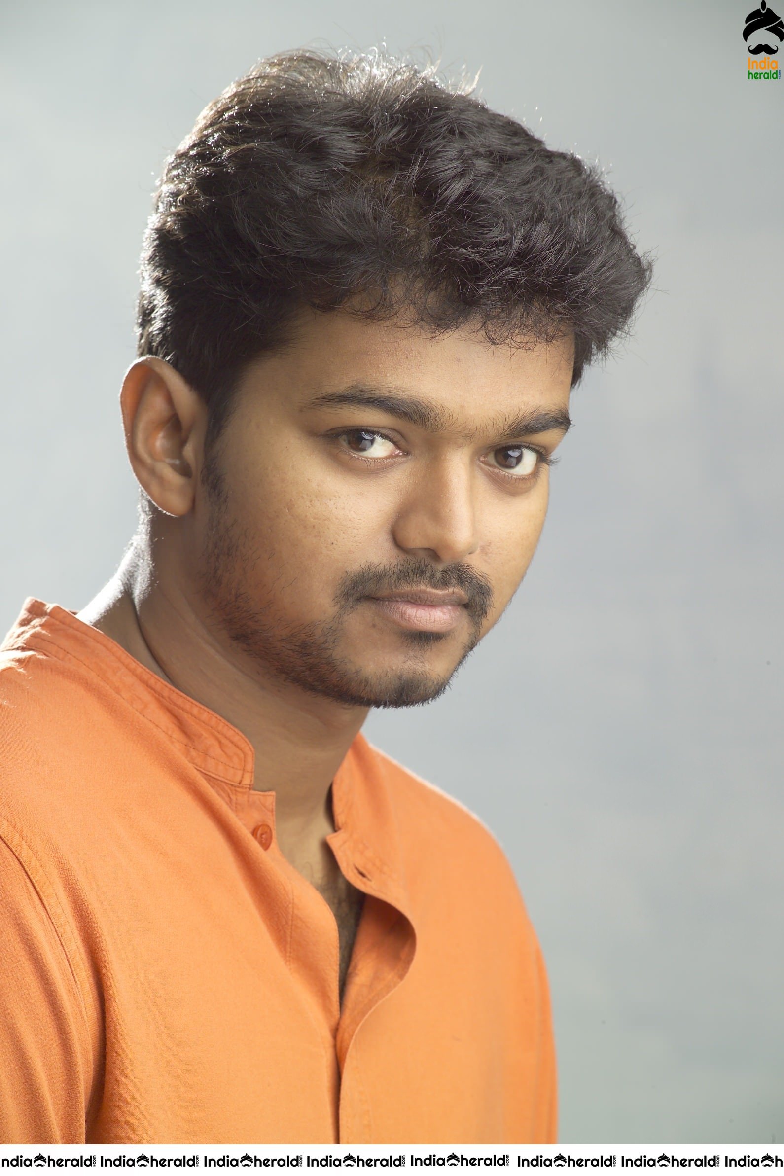 Actor Vijay Unseen Cute Photoshoot Stills in Orange Tee