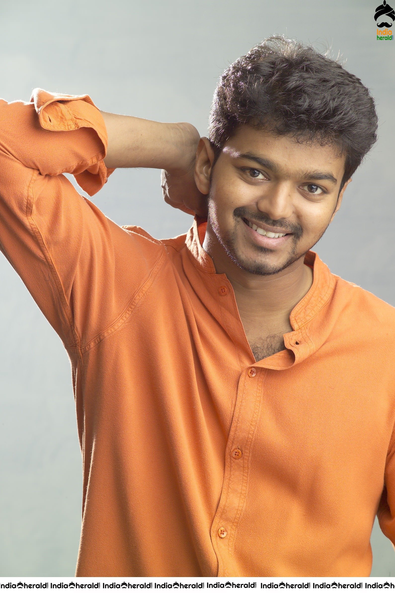 Actor Vijay Unseen Cute Photoshoot Stills in Orange Tee