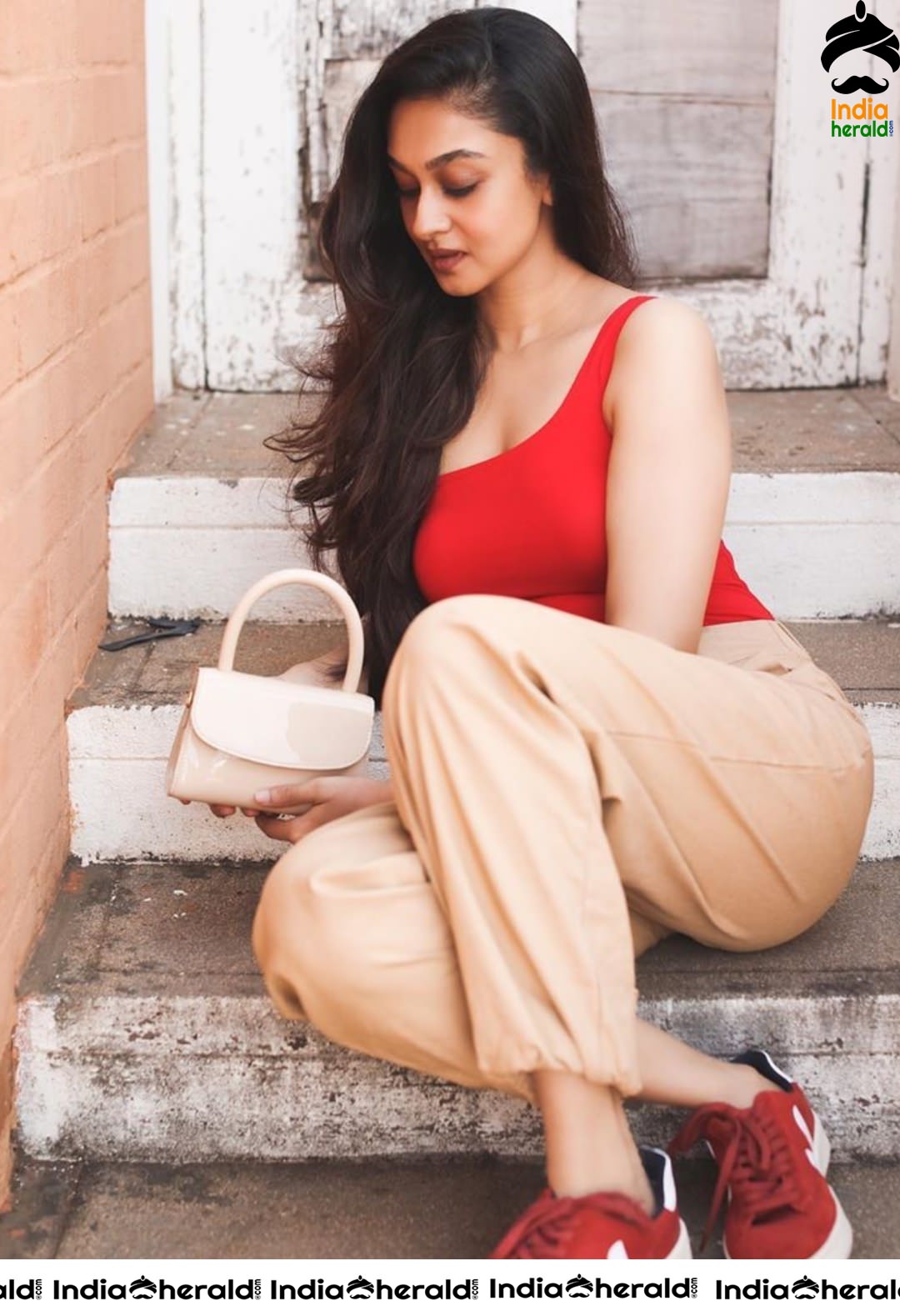 Aishwarya Arjun in Red Sleeveless Banian and she is too hot