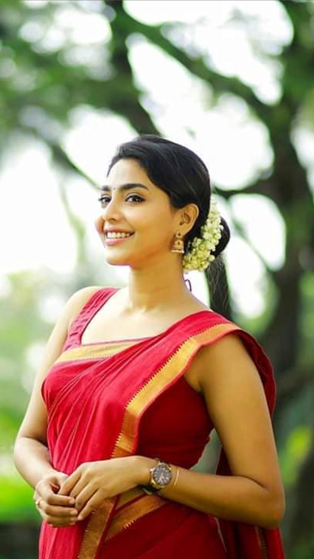 Aishwarya Lakshmi Latest Stills In Red Saree And Sleeveless Blouse