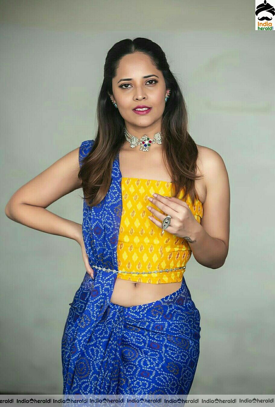 Anasuya Hot Navel Show In Blue Saree Stills