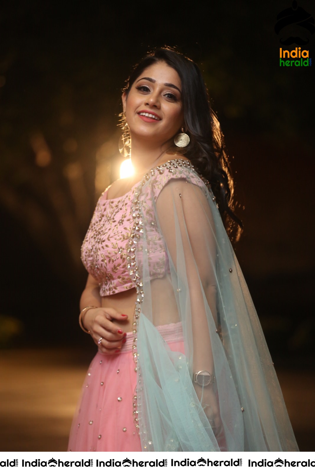 Chandni Bhagwanani Exposing her Waistline and Navel in Pink Attire Set 2