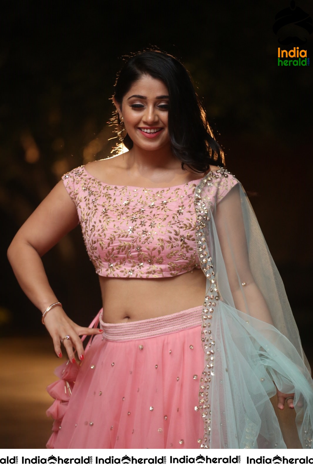 Chandni Bhagwanani Exposing her Waistline and Navel in Pink Attire Set 2