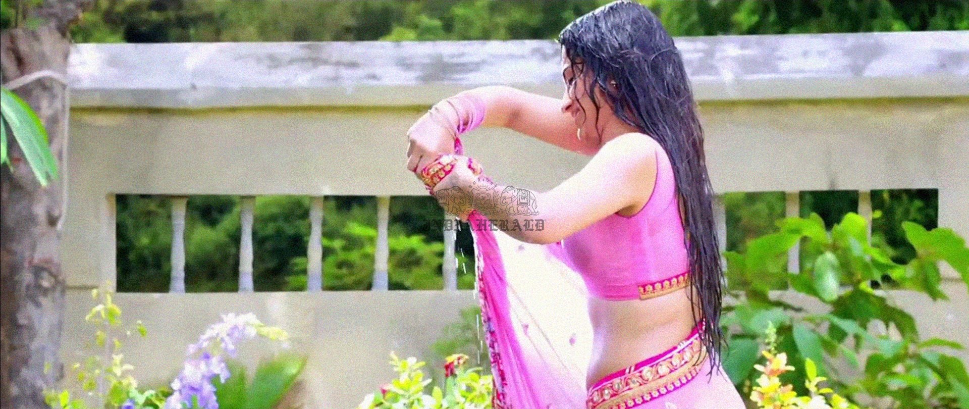 Hottest Photos of Trisha Getting Wet and Stripping Her Saree Set 3