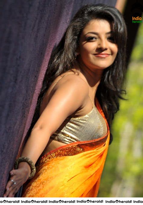 Kajal Aggarwal Exposes her Busty Assets and Hot Hip Curves in Saree in these Hot Photos Set 2