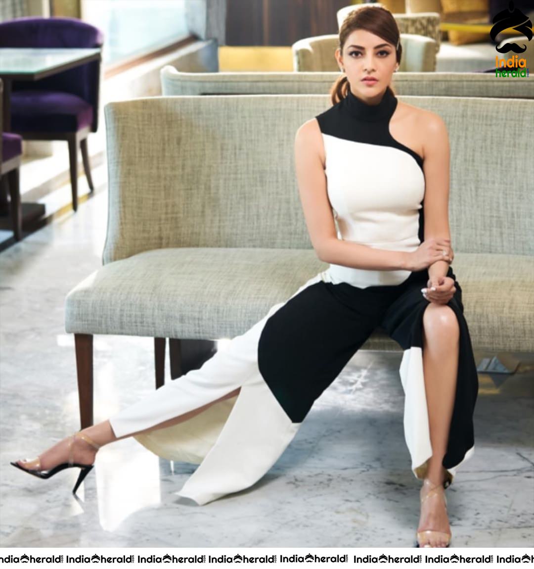 Kajal Aggarwal Hot Show in Sleeveless and Thighs View in Slit Cut Dress