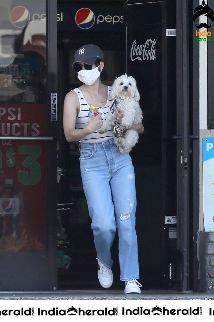 Lucy Hale wears a mask due to COVID19 as she steps out in Beverly Hills