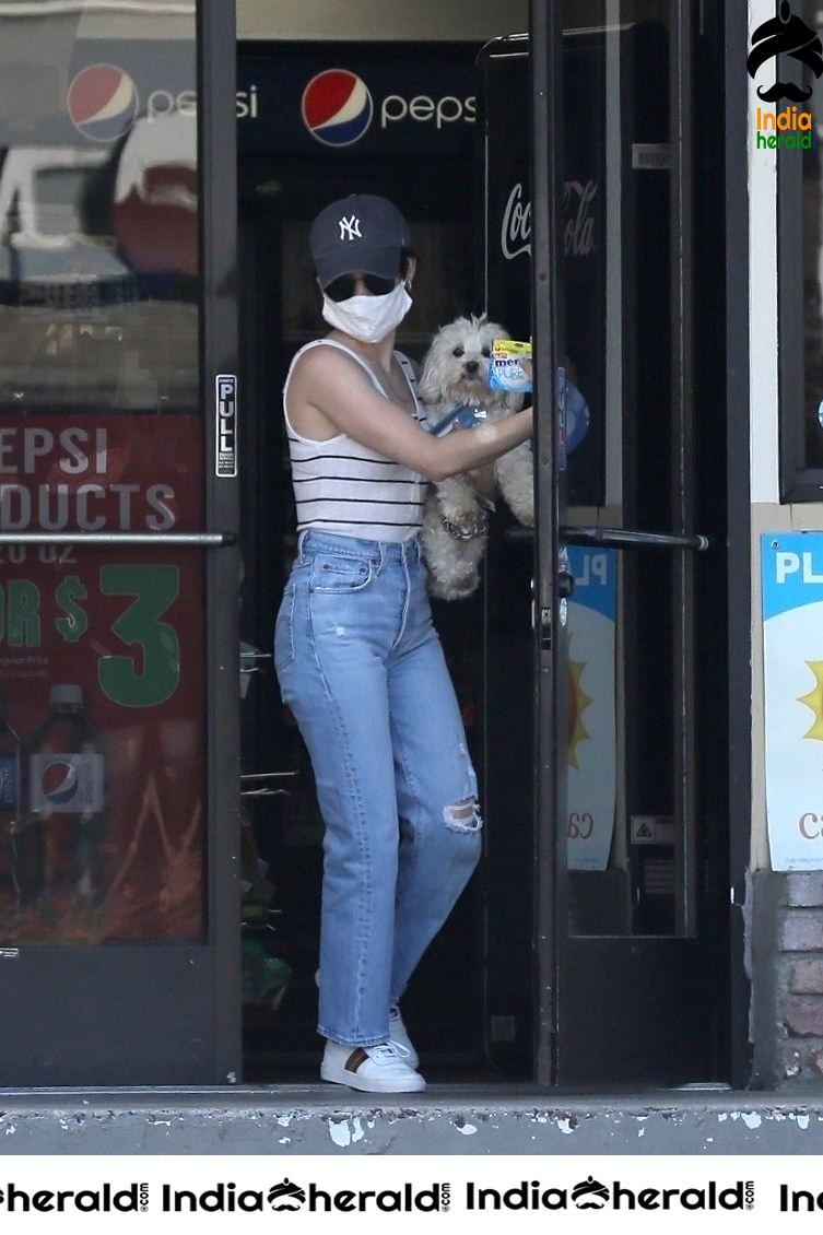 Lucy Hale wears a mask due to COVID19 as she steps out in Beverly Hills