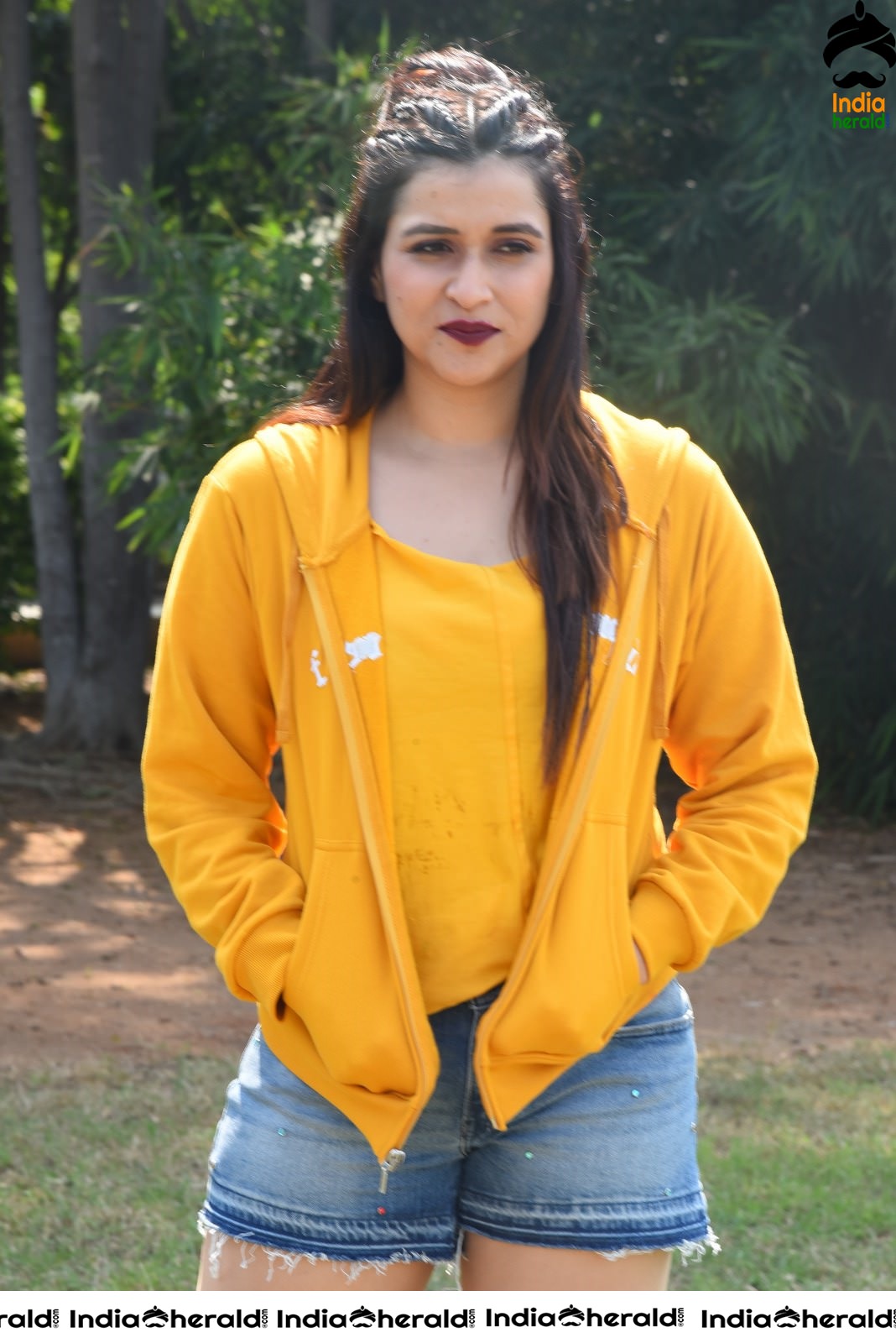 Mannara Chopra Hot Thighs Show in Sexy Shorts and Yellow Jerkin Set 2