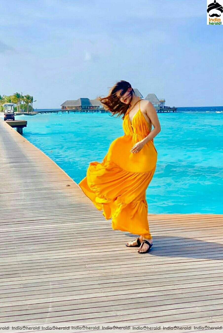 Mouni Roy Hot and Cute Latest Yellow Dress Stills