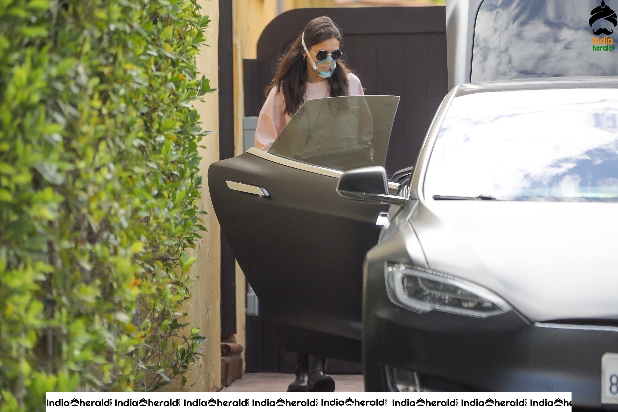 Nina Dobrev Out wearing a surgical mask due to Corona Virus in Los Angeles