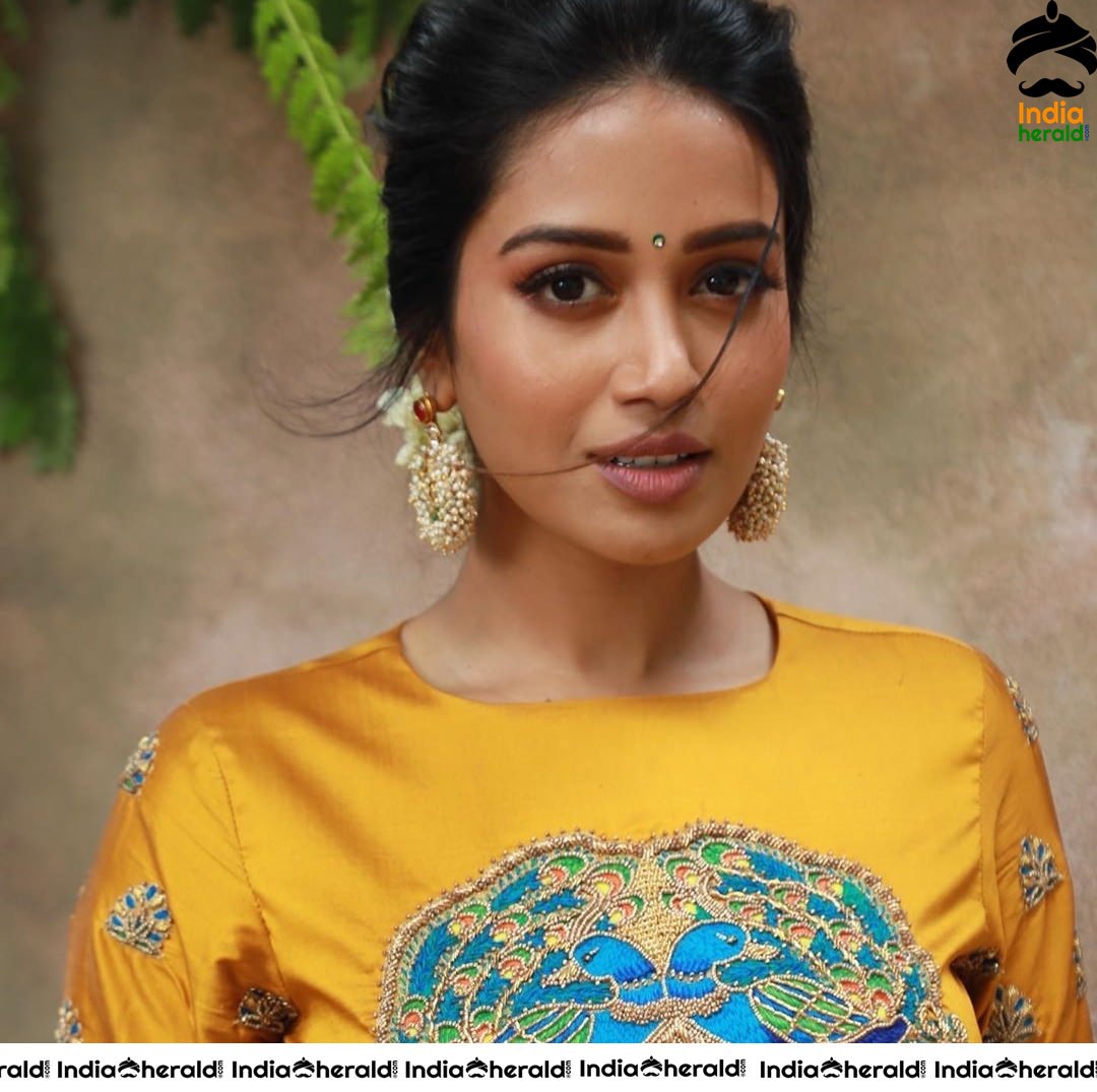 Nivetha Pethuraj Raises the Heat in Tight Blouse and Exposing her Back Stills