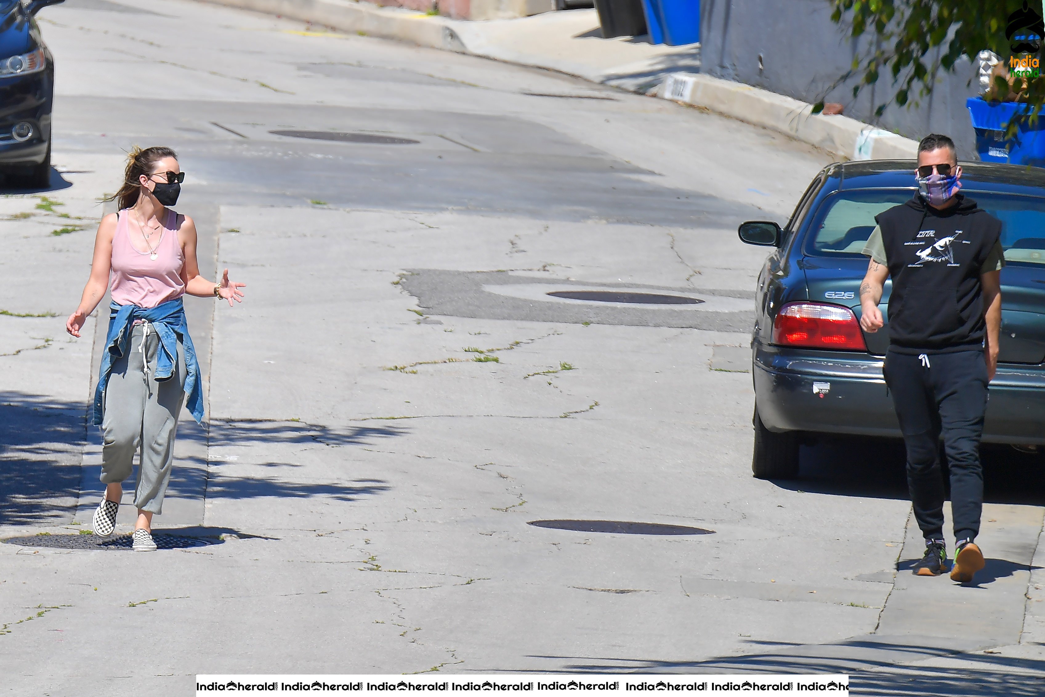 Olivia Wilde caught by Paparazzi with masks when out for a walk in Santa Monica