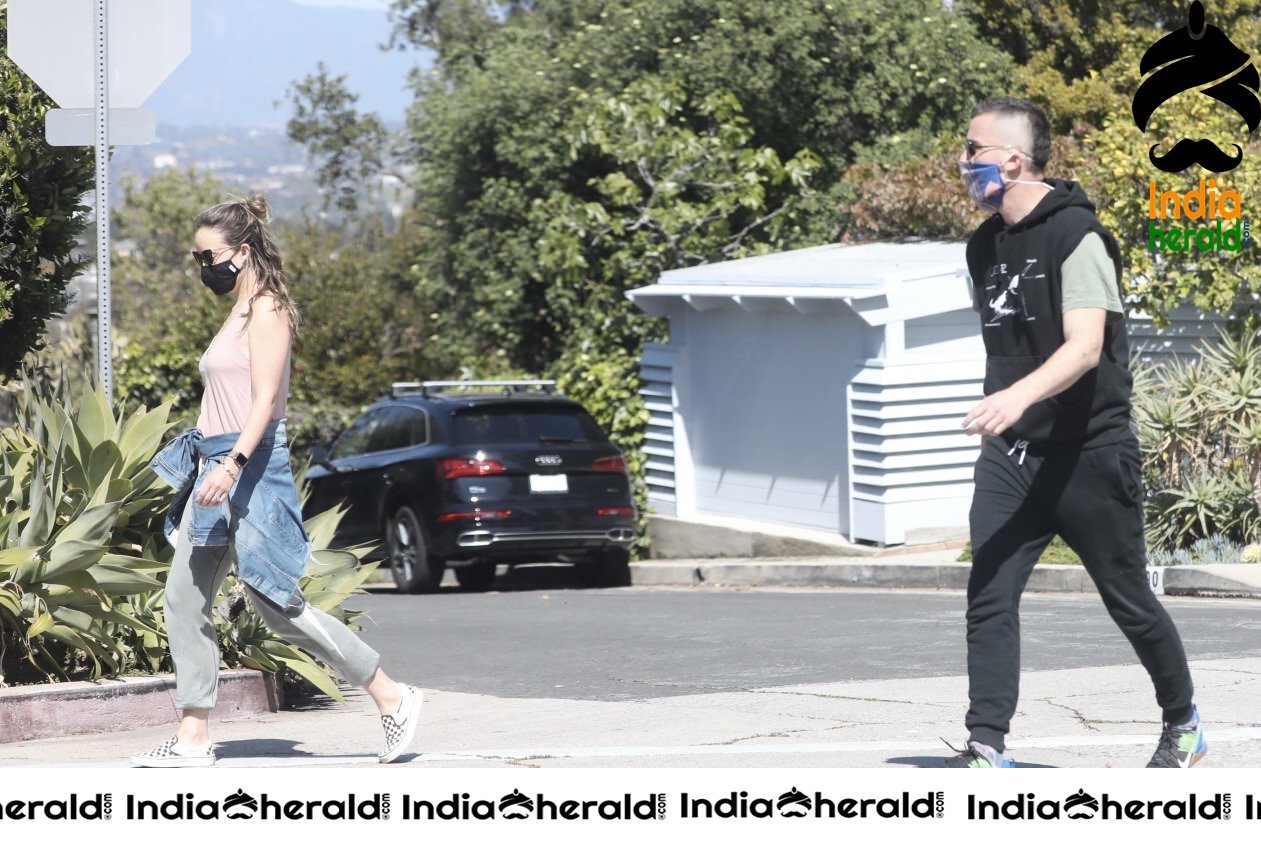 Olivia Wilde caught by Paparazzi with masks when out for a walk in Santa Monica