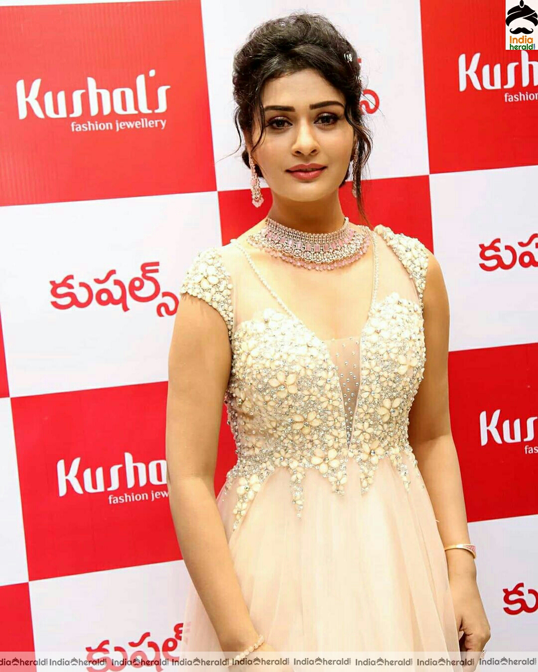 Payal Rajput Cute Golden Dress Stills