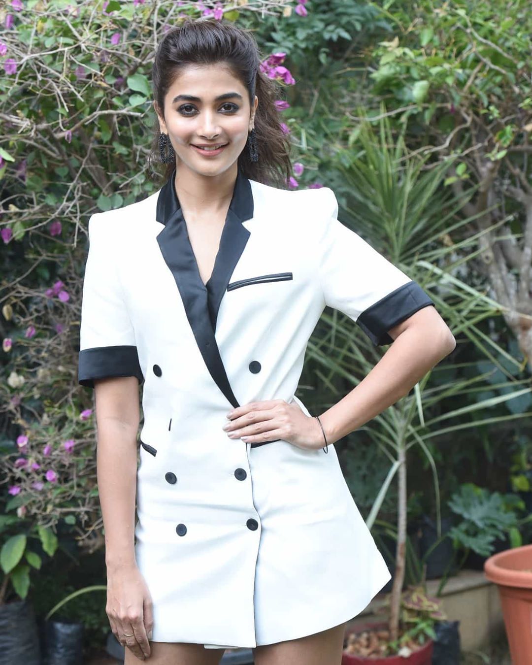 Pooja Hegde Hot Thighs Shows In White Coat Stills