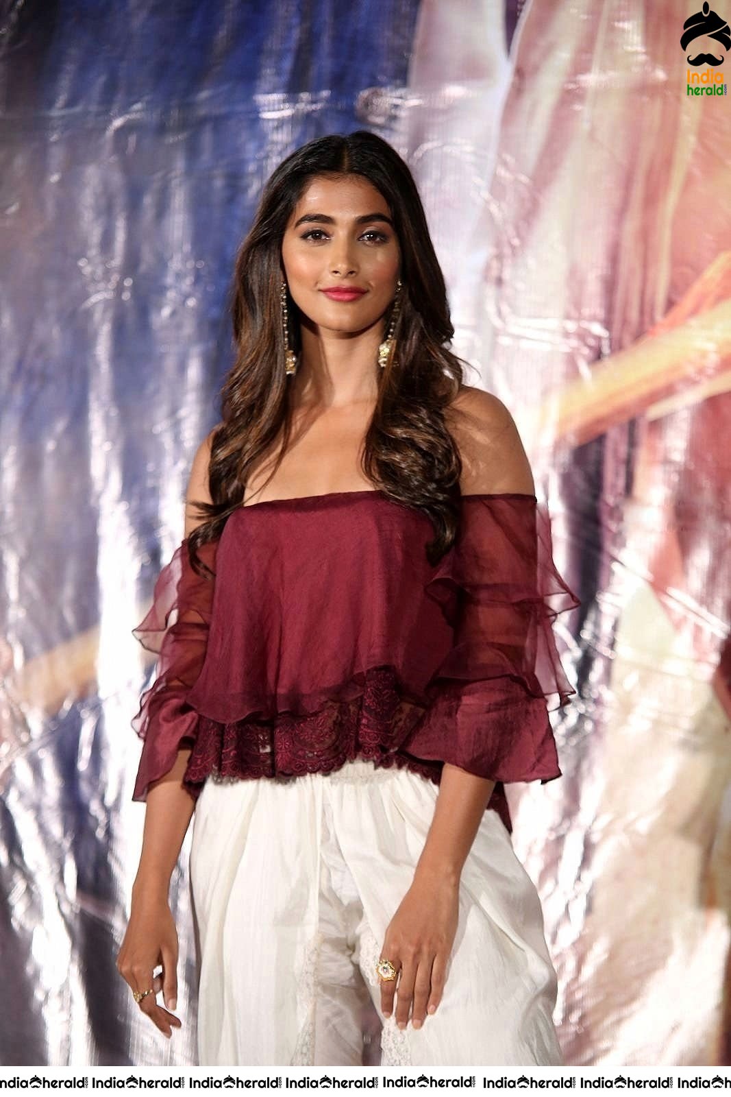 Pooja Hegde Looking Super Hot and Sexy in Maroon Low Neck Top Set 1