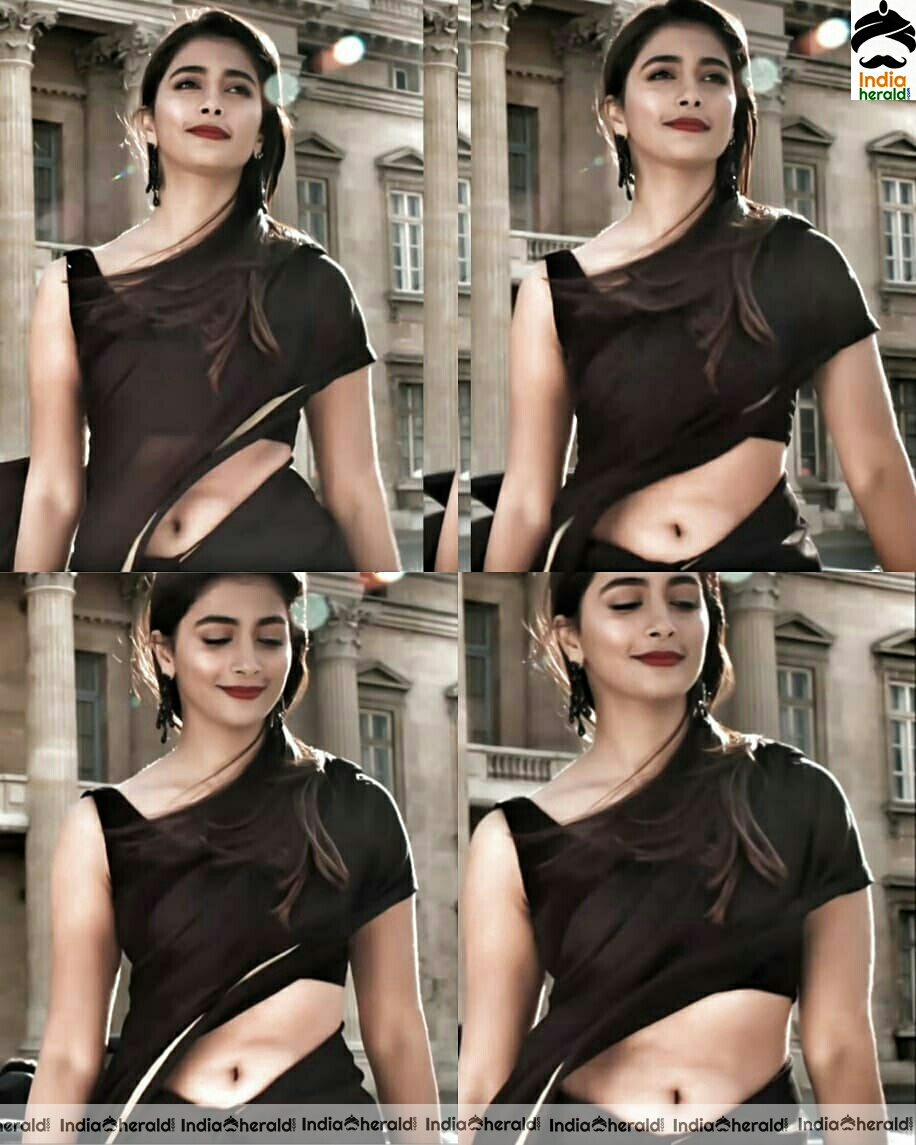 Pooja Hegde tempting hot Navel show in Saree is an absolute treat for our eyes