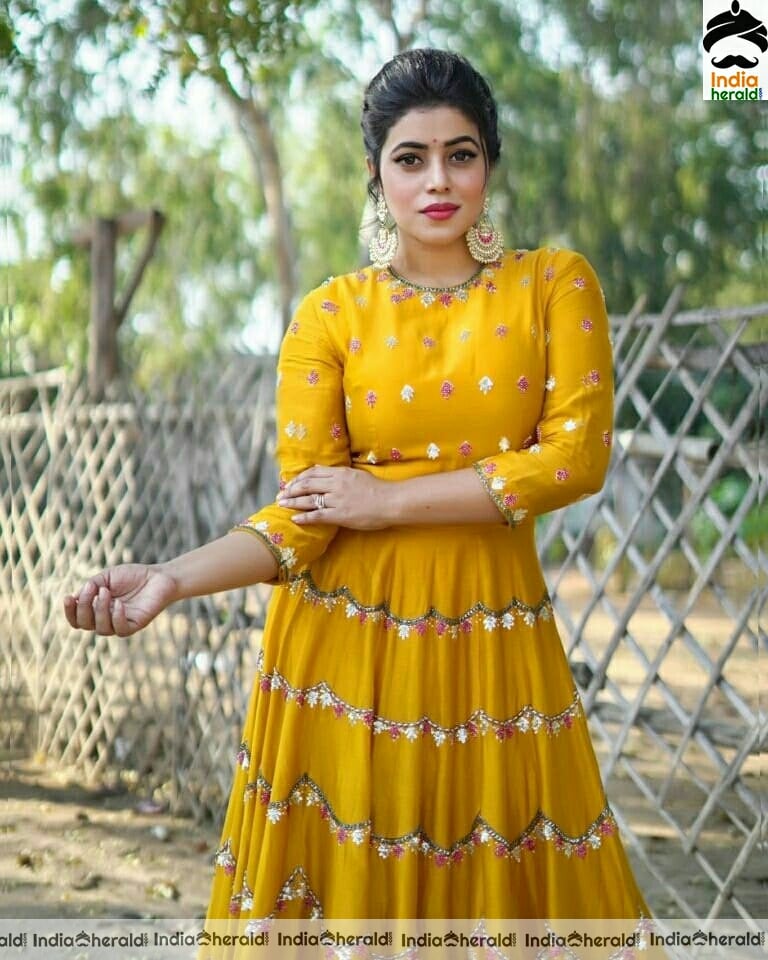 Poorna Cute Latest Yellow Dress Stills