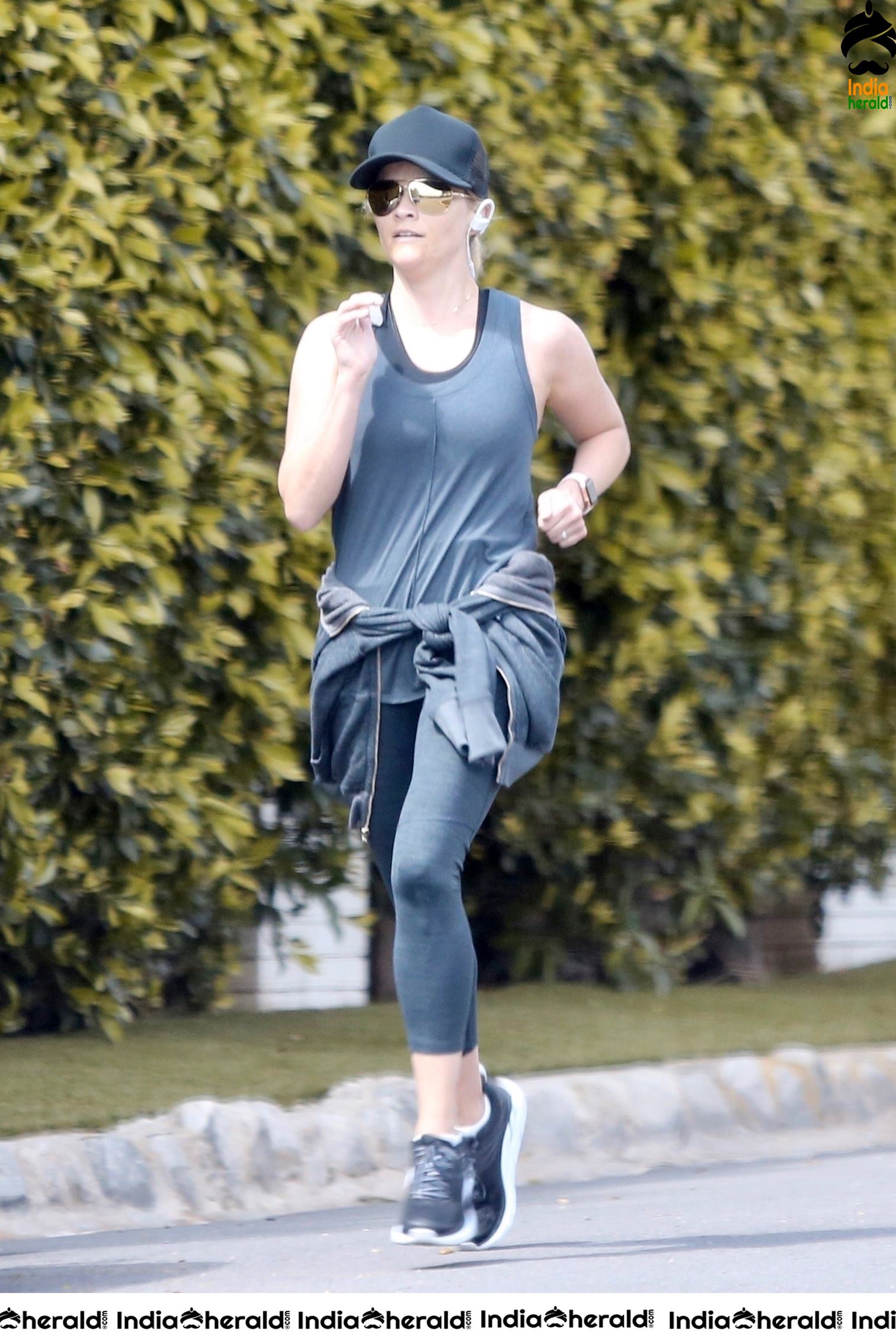 Reese Witherspoon caught by Paparazzi while jogging in Brentwood