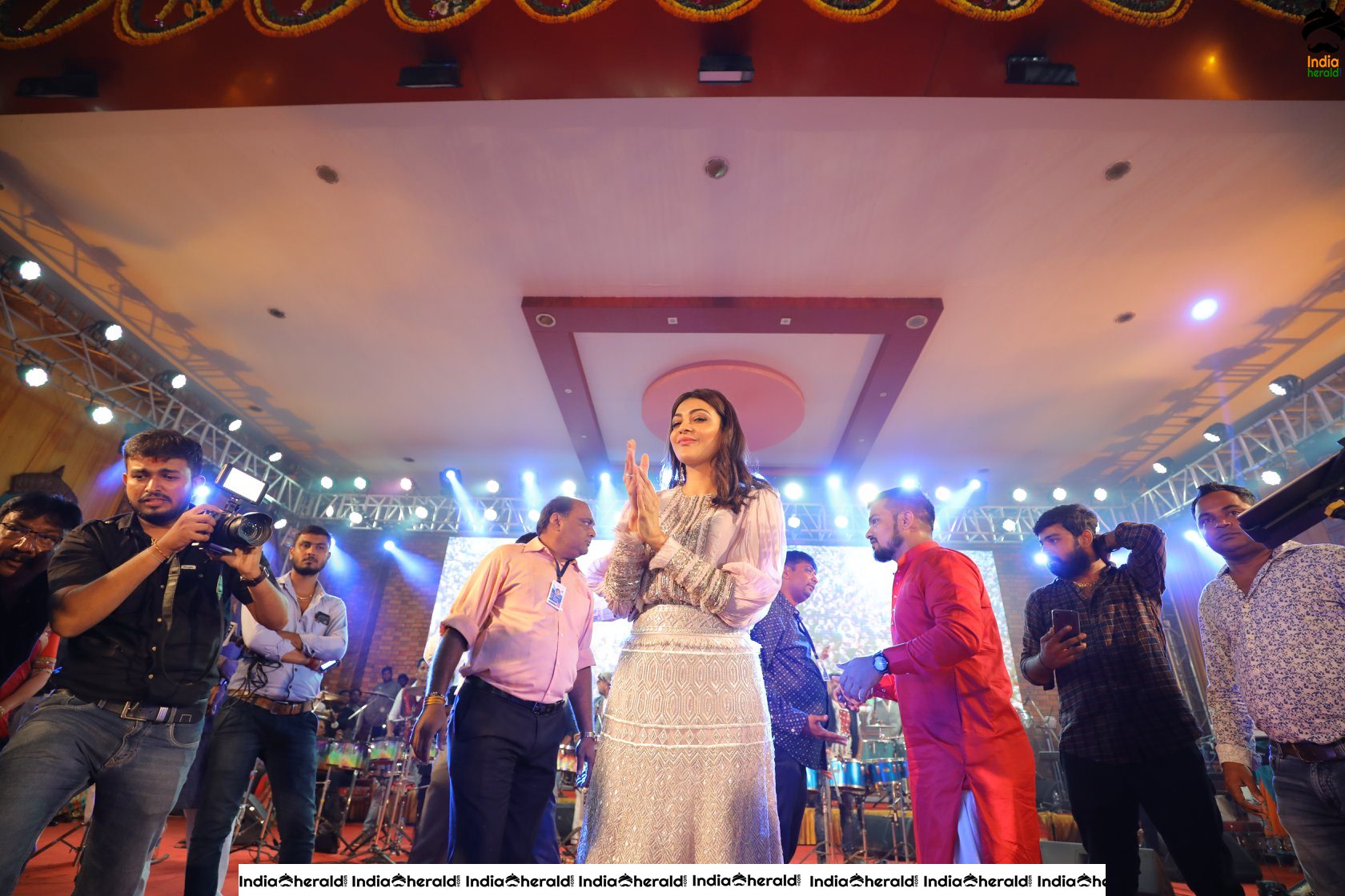 Kajal Aggarwal Looking Angelic in White before a massive crowd during a Public Event Set 8