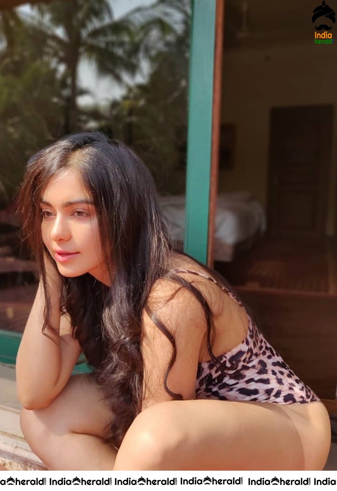 Adah Sharma Hot Thigh Show in Single Piece Bikini