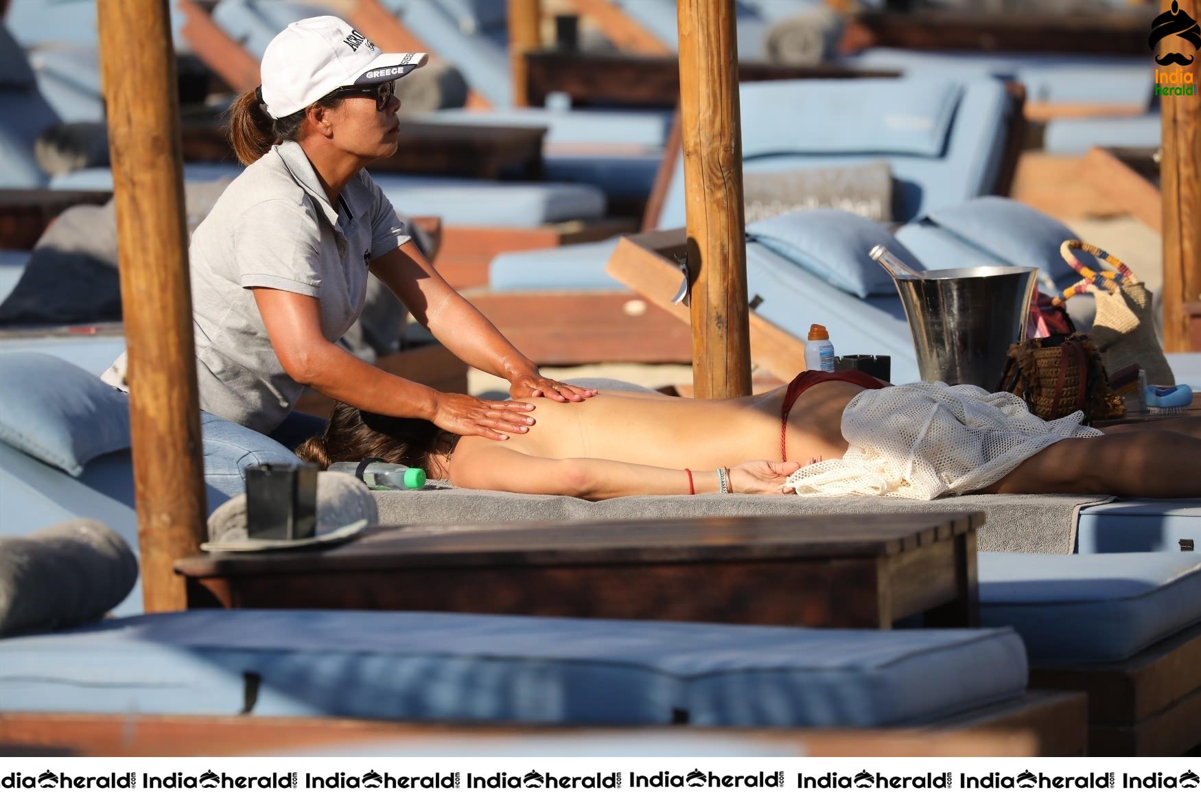 Alessandra Ambrosio Exposing Too Much in String Bikini on the beach in Mykonos Set 1