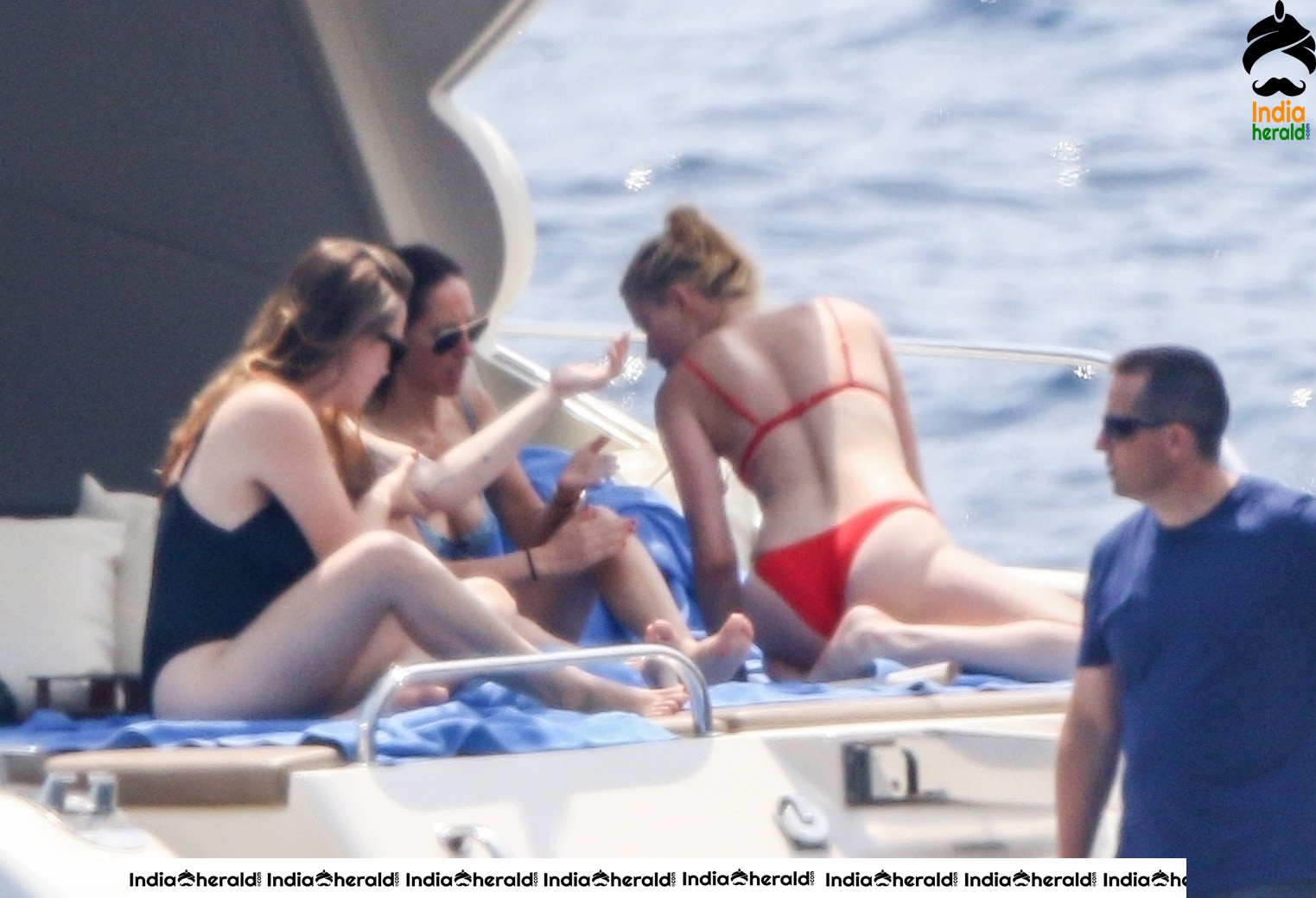 Amber Heard in Two Piece Bikini and enjoys a day with friends on a yacht at the Amalfi Coast