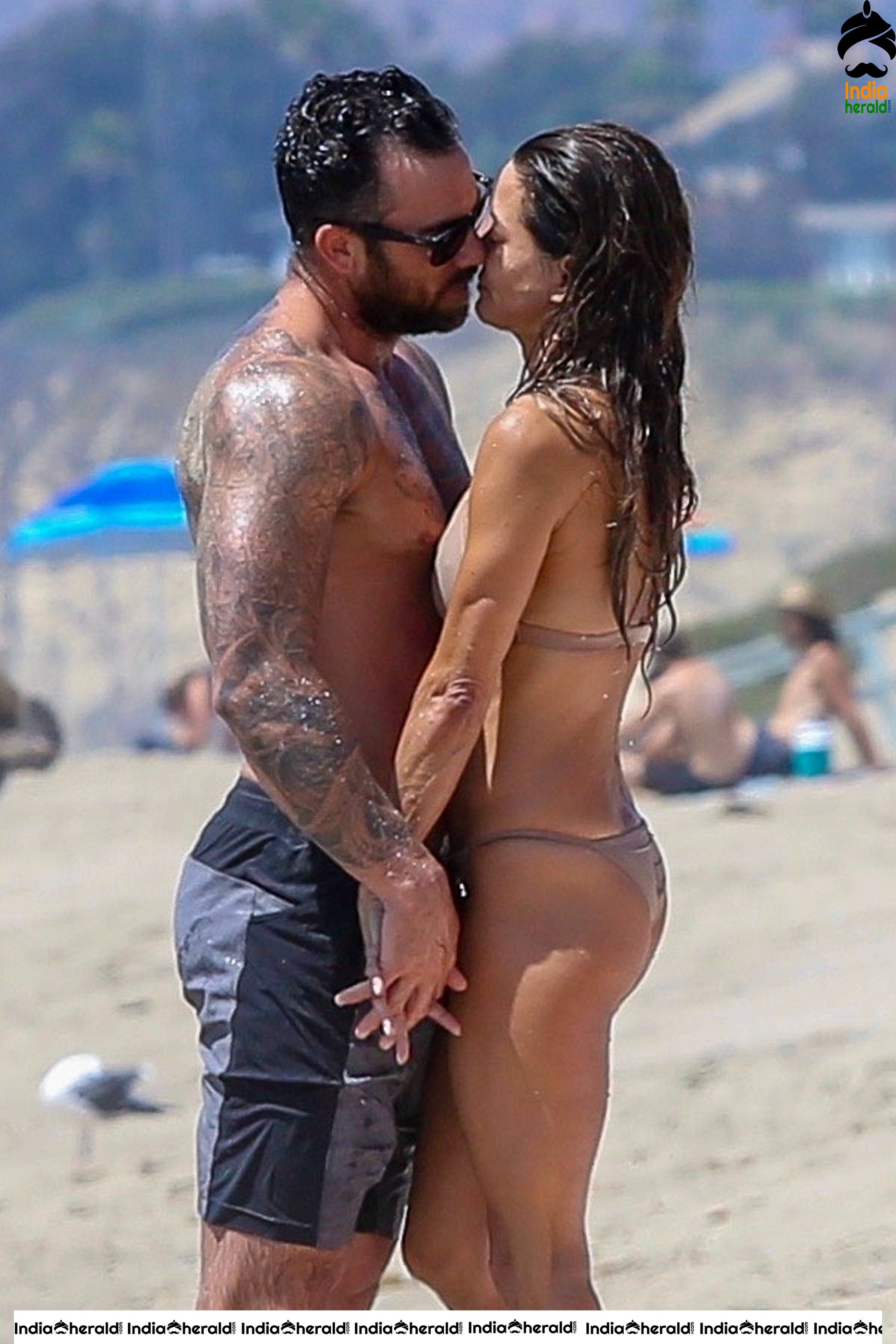 Brooke Burke in Bikini enjoying with Boyfriend on the beach in Malibu Set 1