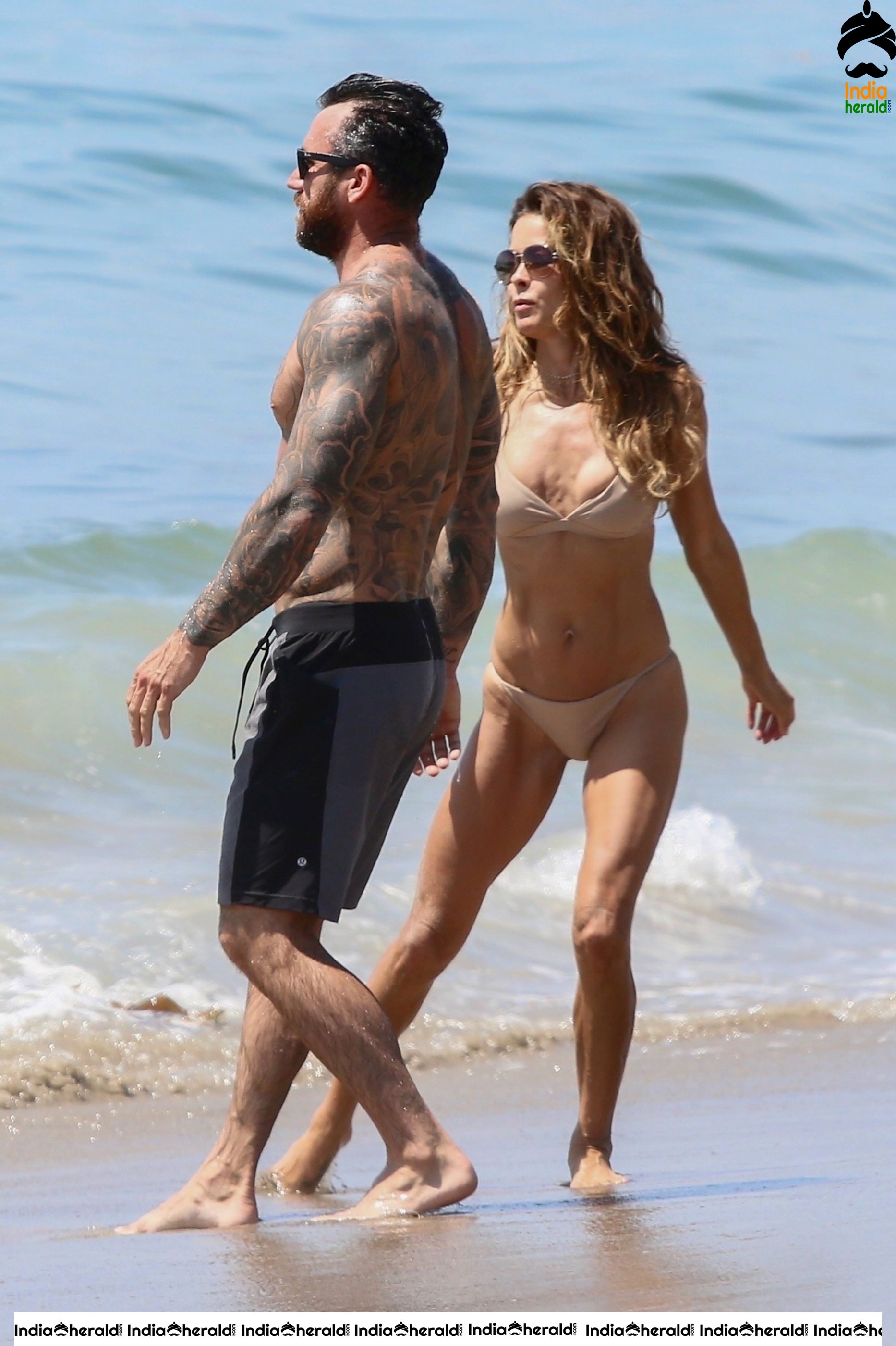 Brooke Burke in Bikini enjoying with Boyfriend on the beach in Malibu Set 1