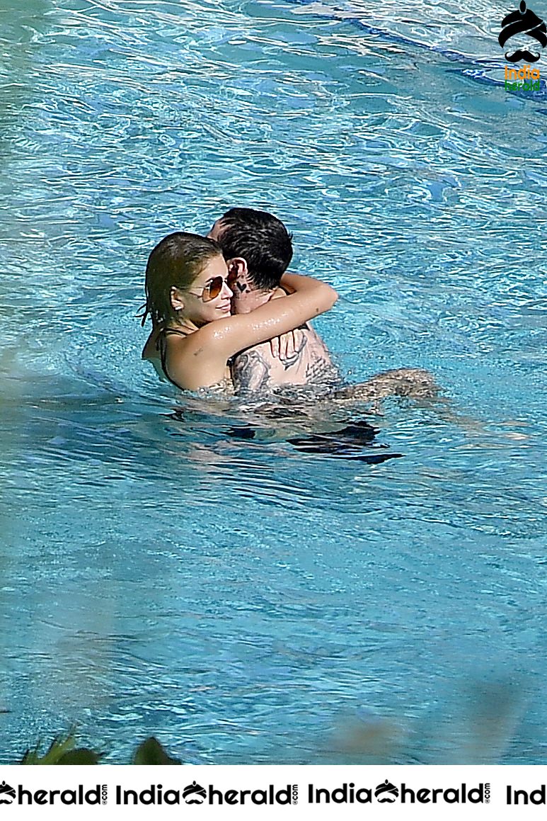 Kaia Gerber in a Black Bikini at a Pool in Miami