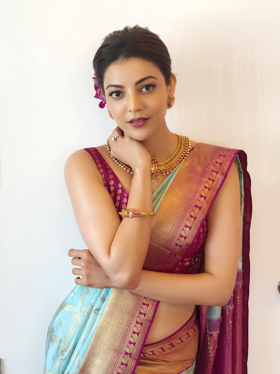 Kajal Aggarwal Hot Hip and Navel Show in Saree