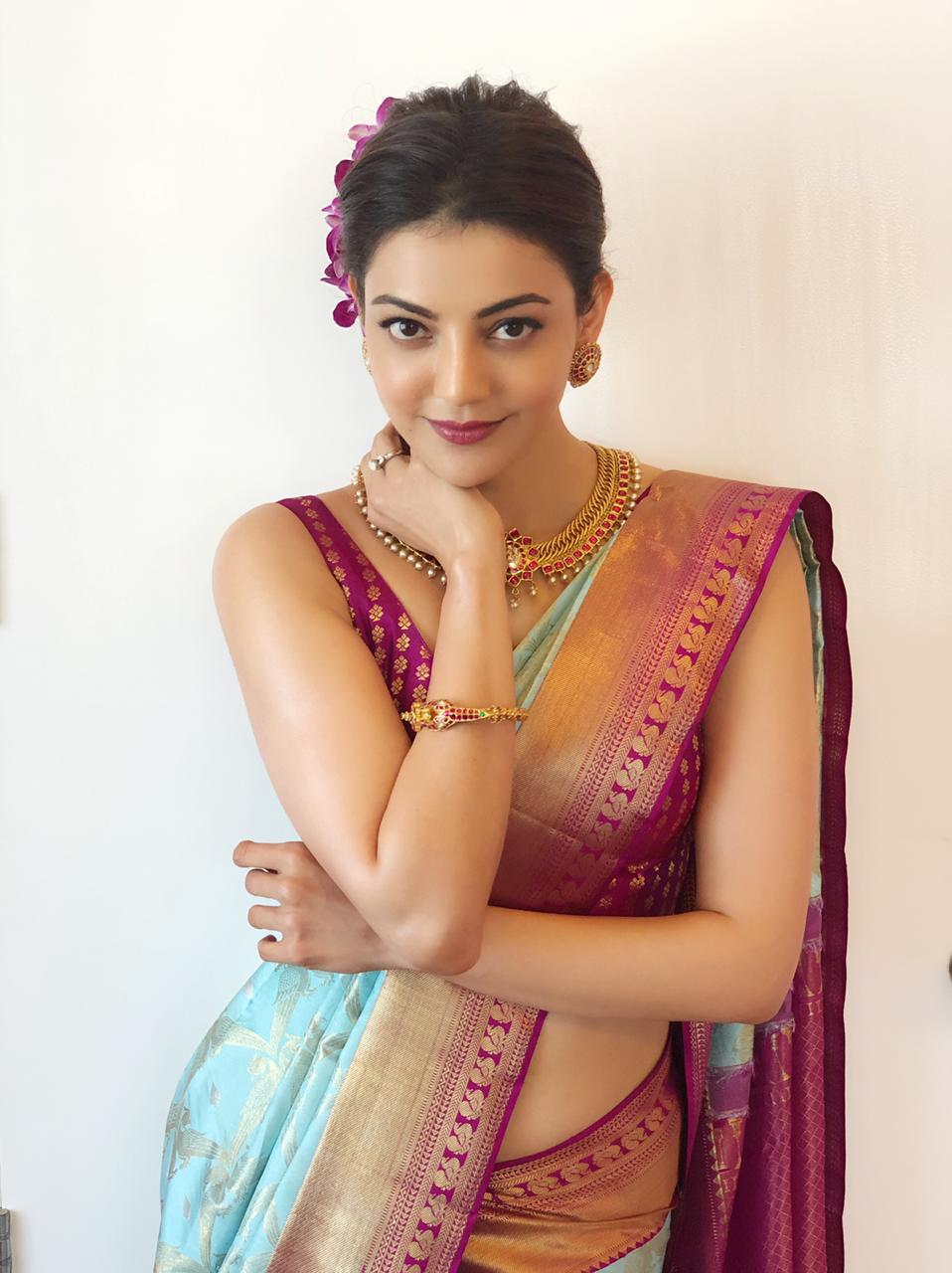 Kajal Aggarwal Hot Hip and Navel Show in Saree