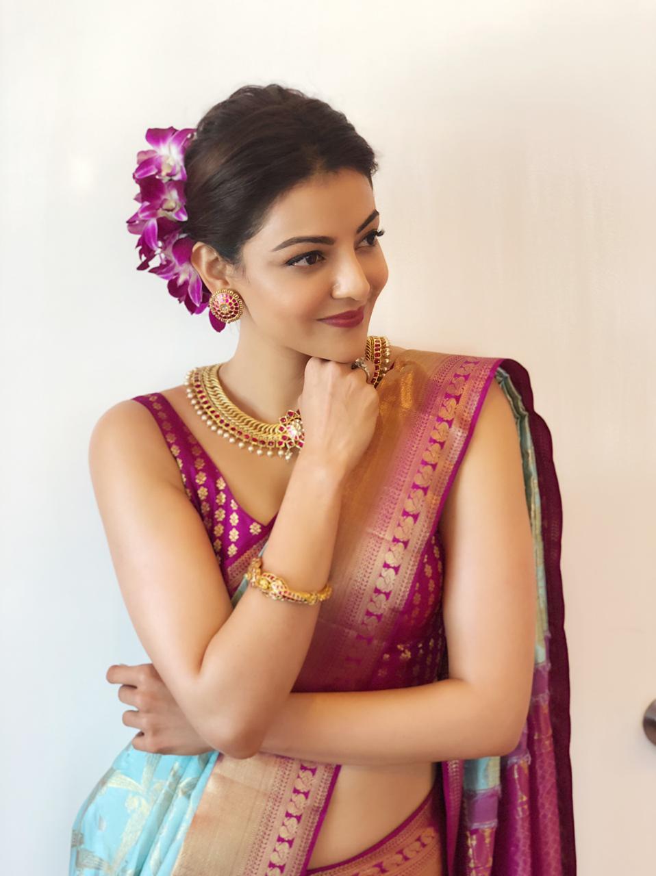 Kajal Aggarwal Hot Hip and Navel Show in Saree