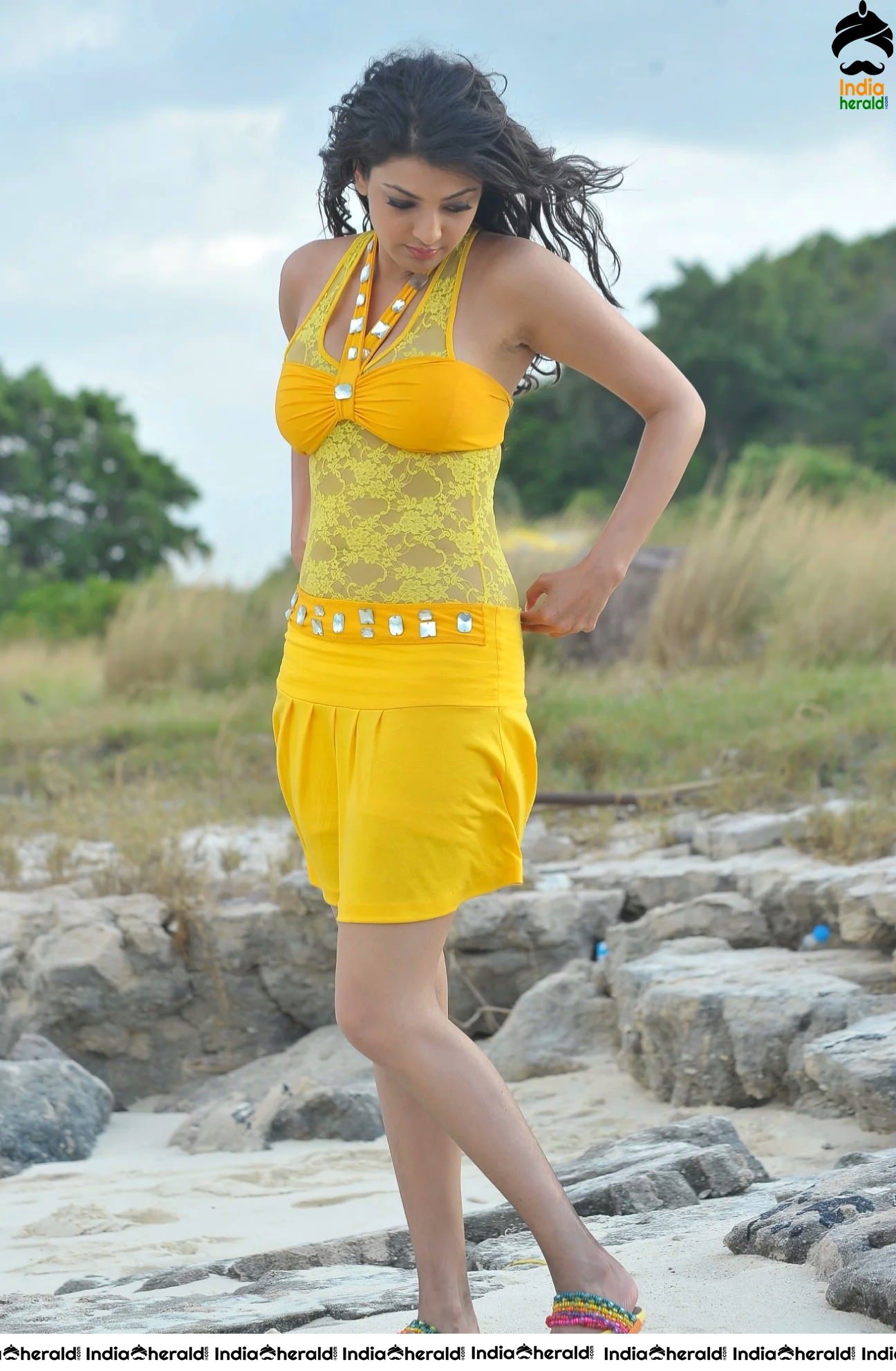 Kajal Aggarwal Hot Photos by Beach Side in Short Bikini Frock