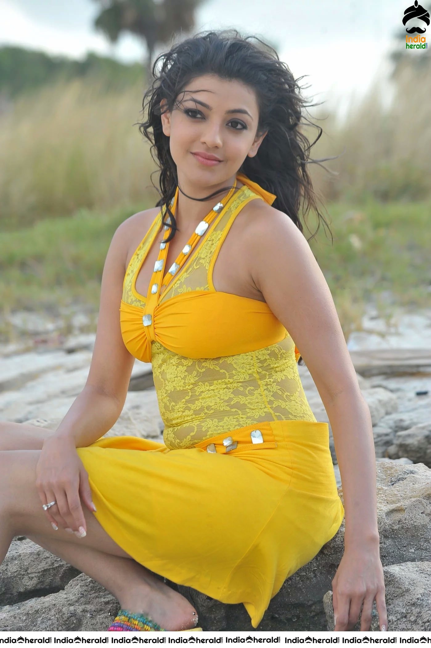 Kajal Aggarwal Hot Photos by Beach Side in Short Bikini Frock