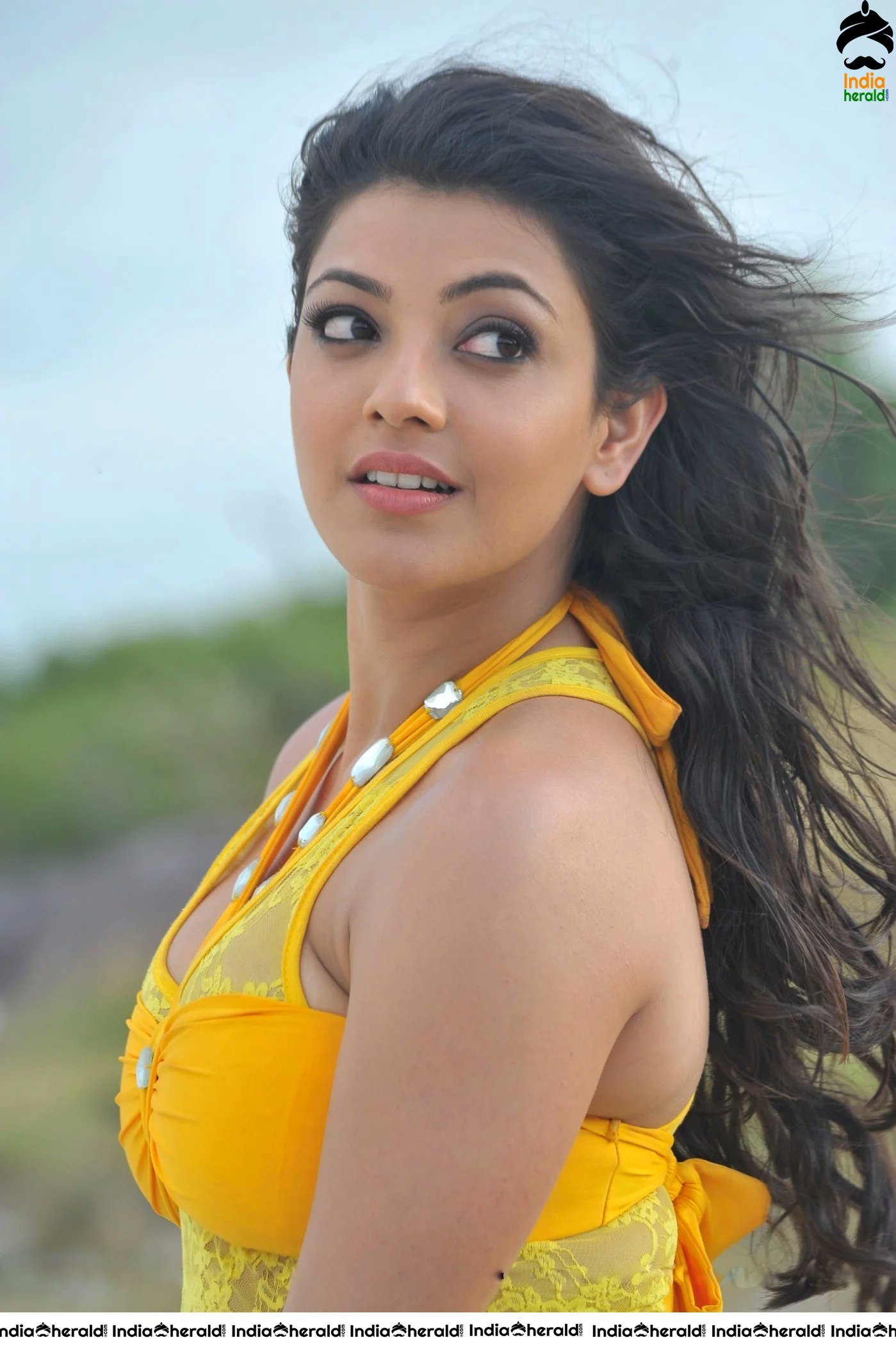 Kajal Aggarwal Hot Photos by Beach Side in Short Bikini Frock