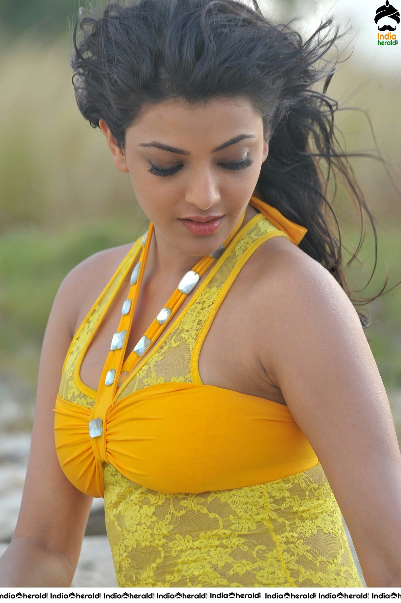 Kajal Aggarwal Hot Photos by Beach Side in Short Bikini Frock