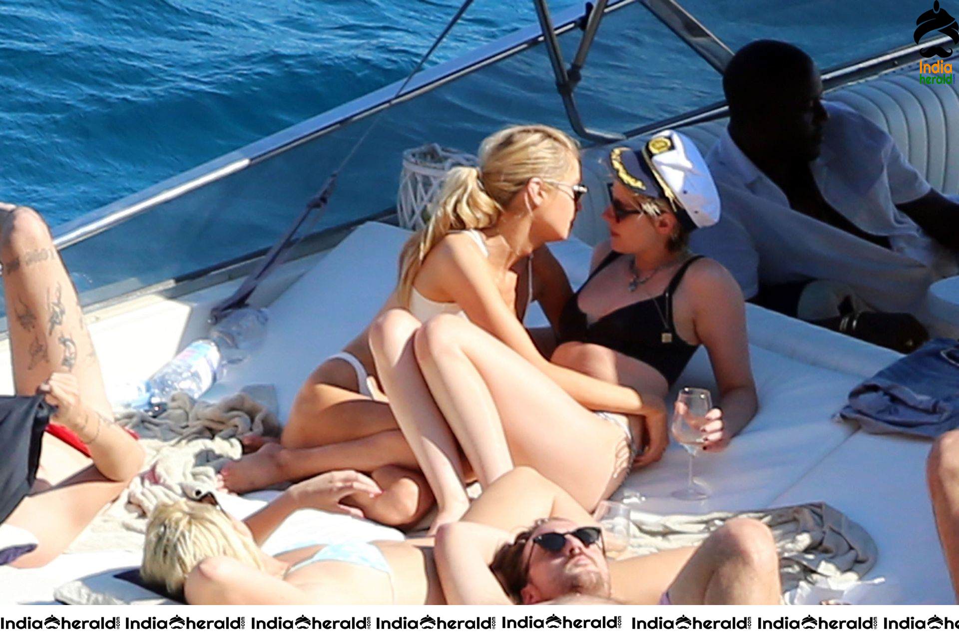 Kristen Stewart and Stella Maxwell Kissing and Cuddling each other in Bikinis at a Boat in Italy Set 2