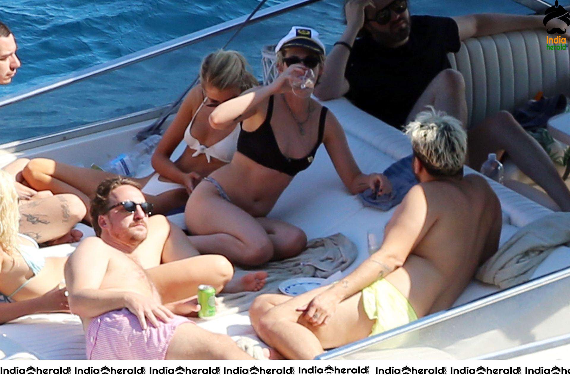 Kristen Stewart and Stella Maxwell Kissing and Cuddling each other in Bikinis at a Boat in Italy Set 2