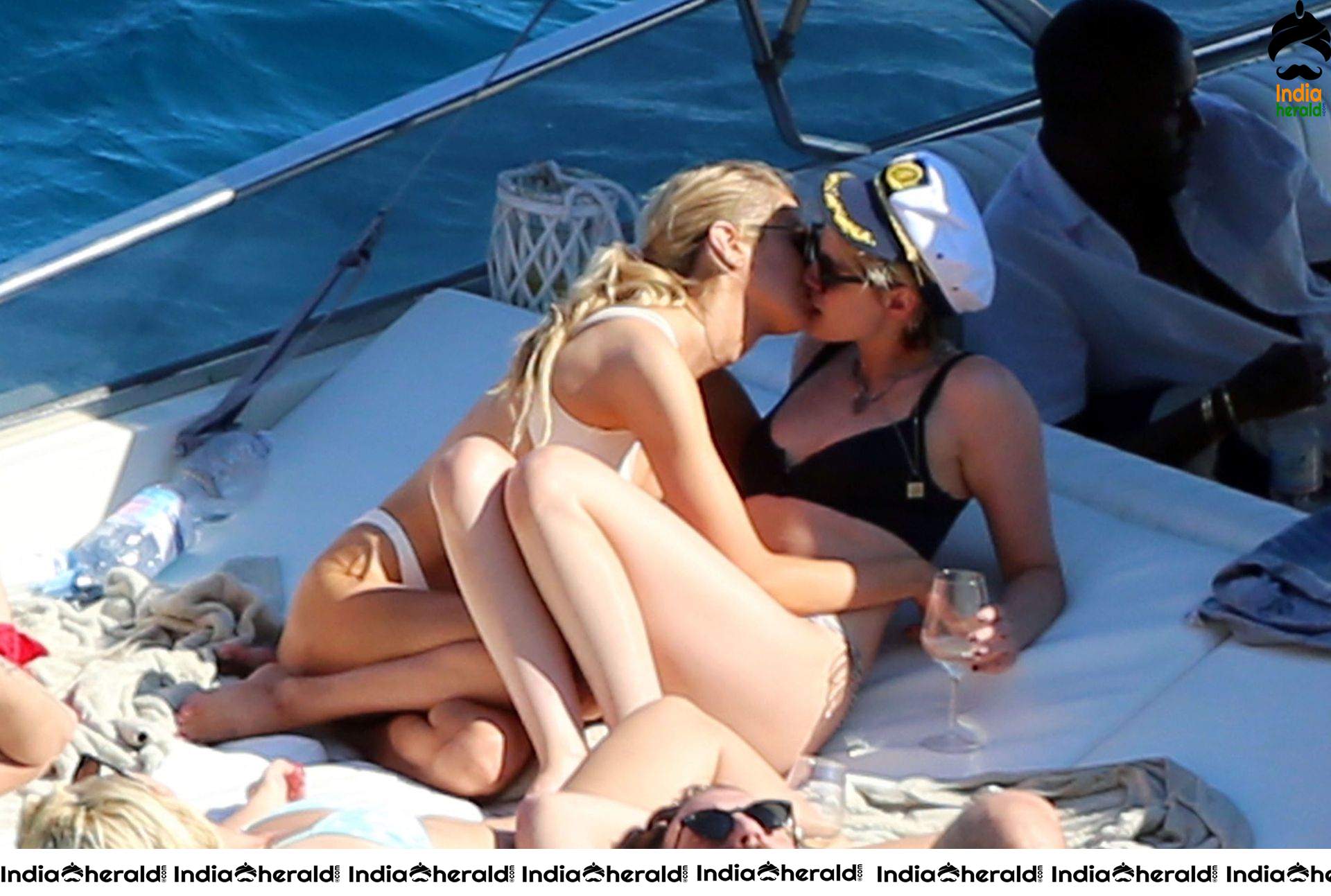 Kristen Stewart and Stella Maxwell Kissing and Cuddling each other in Bikinis at a Boat in Italy Set 2