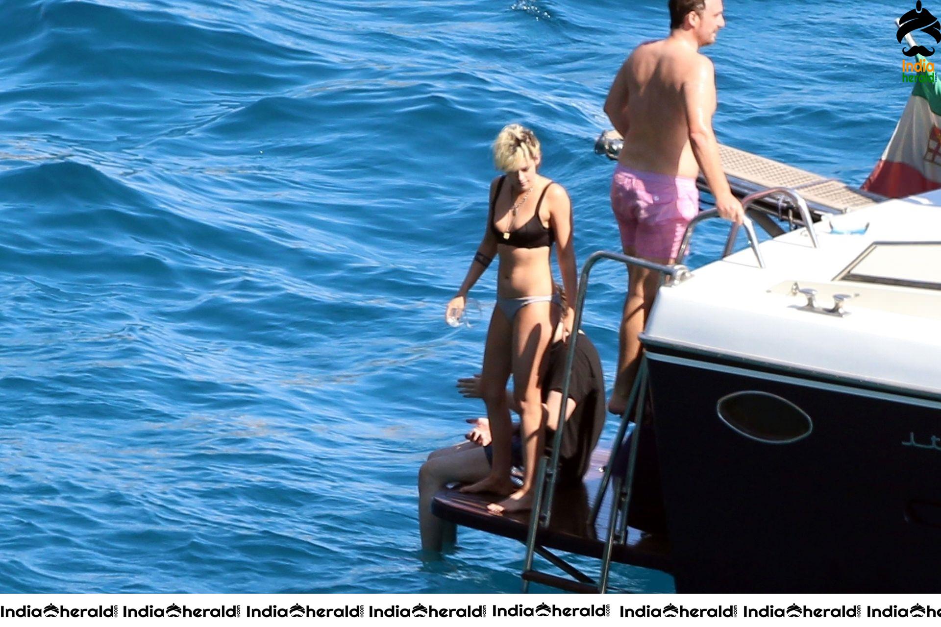 Kristen Stewart and Stella Maxwell Kissing and Cuddling each other in Bikinis at a Boat in Italy Set 2