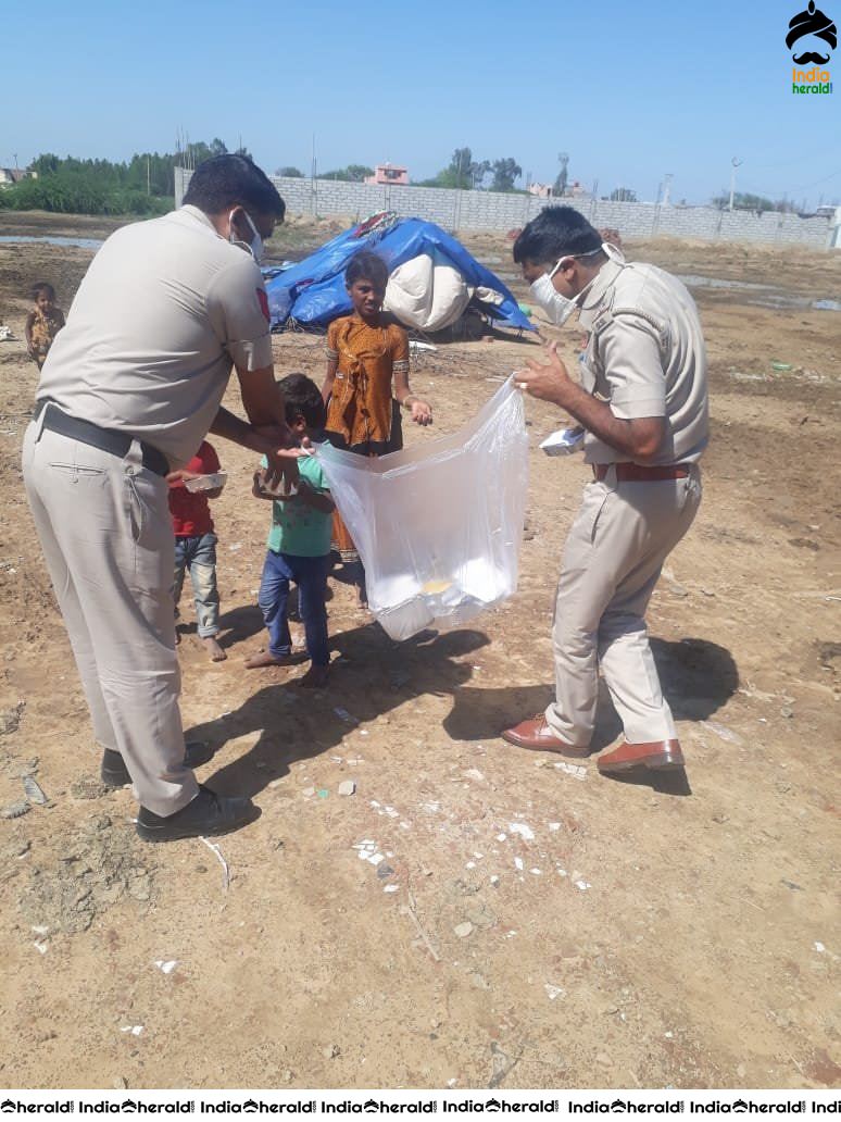 Personnel of Haryana Police distributed food among the needy amid the COVID 19 Lockdown