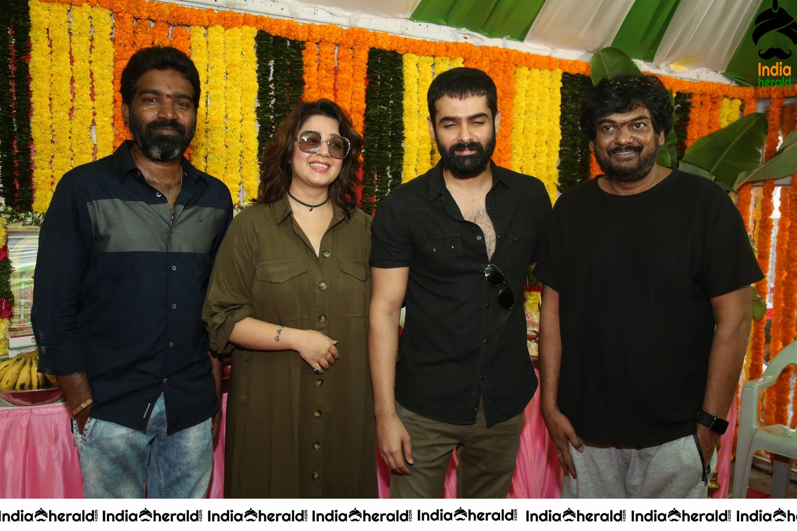 Actor Ram Pothineni stills with Charmi and Puri Jagannath S